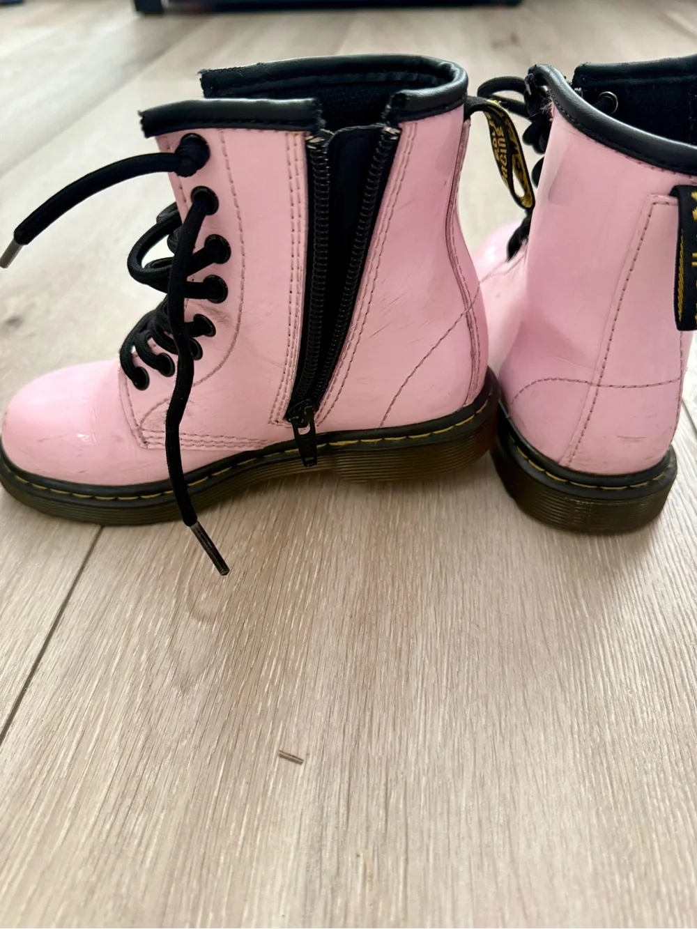 Dr. Martens Pink Lace-Up Kids Combat Boots with Black Laces